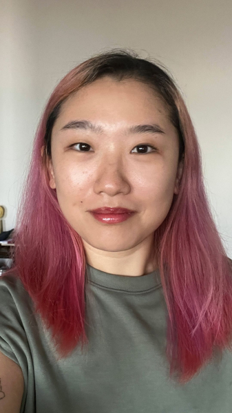 A selfie of Allure commerce editor Sarah Han after applying Gisou Honey Milk 5in1 Styling Cream